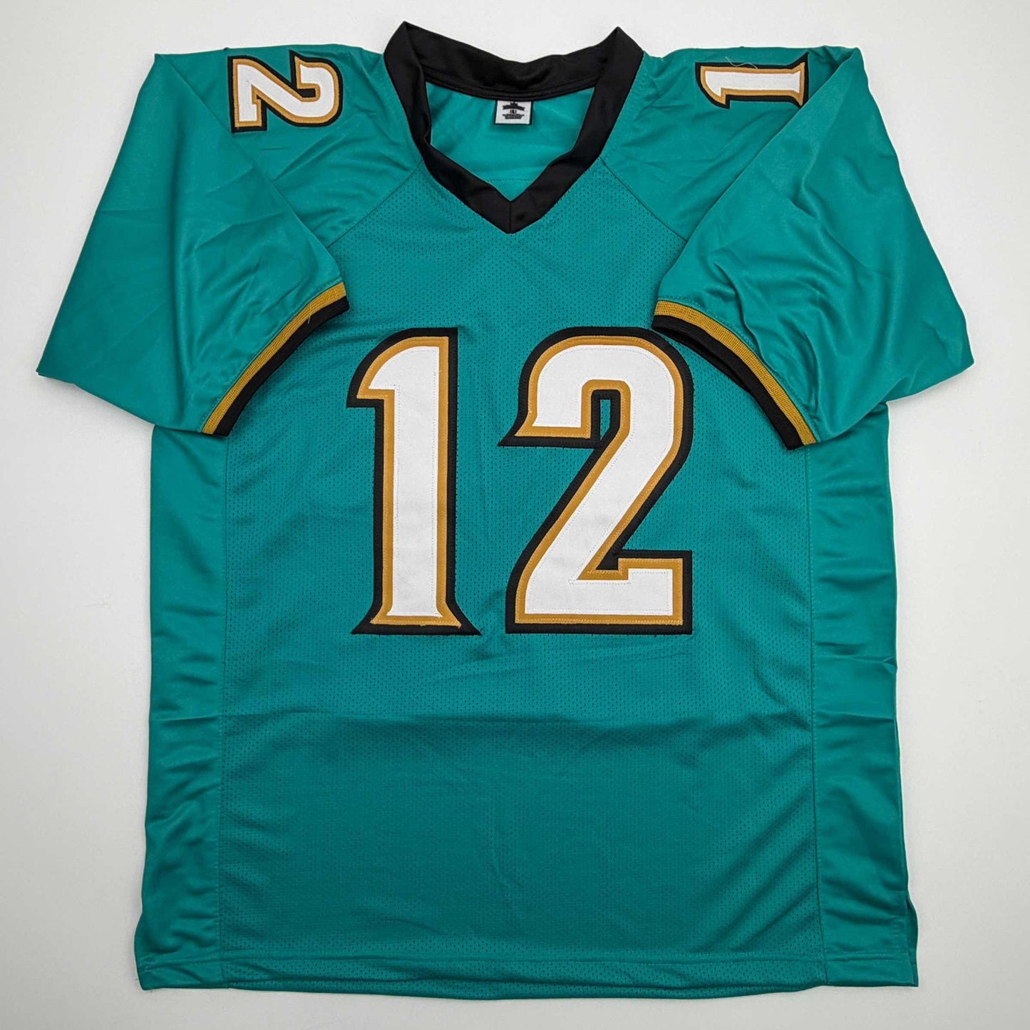 Autographed/Signed Travis Hunter Jacksonville Teal Retro Football Jersey Beckett BAS COA