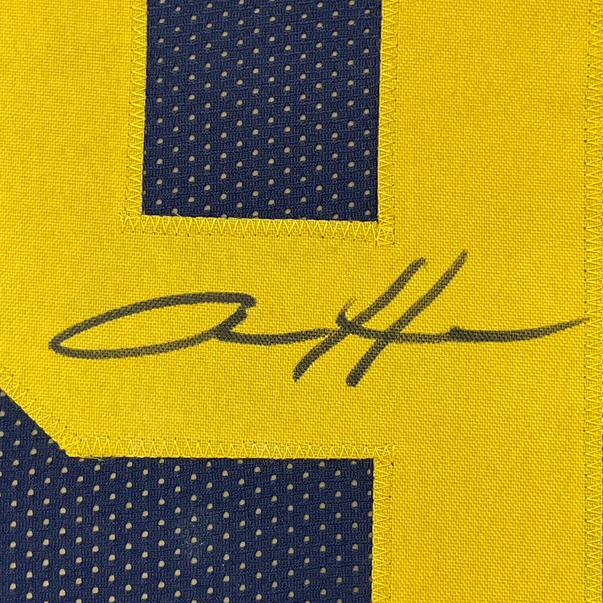 Framed Autographed/Signed Aidan Hutchinson 35x39 Michigan Blue College Football Jersey Beckett BAS COA