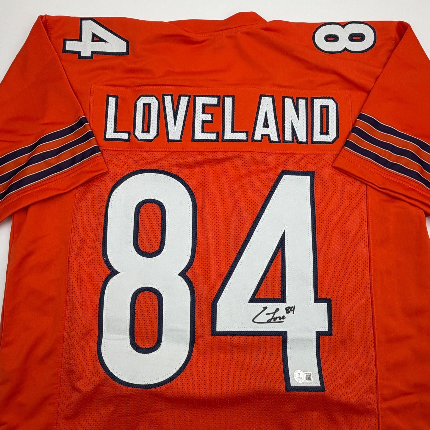 Autographed/Signed Colston Loveland Chicago Orange Football Jersey Beckett BAS COA