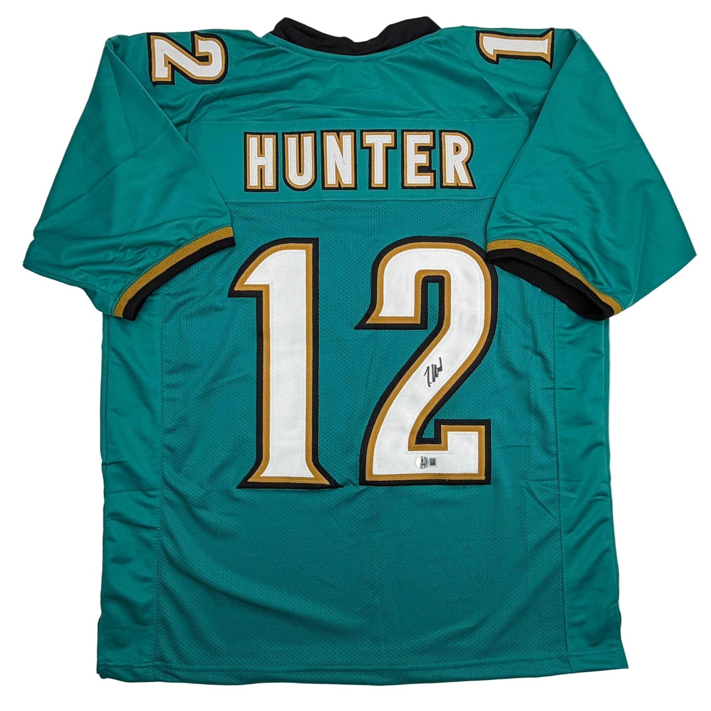 Autographed/Signed Travis Hunter Jacksonville Teal Retro Football Jersey Beckett BAS COA