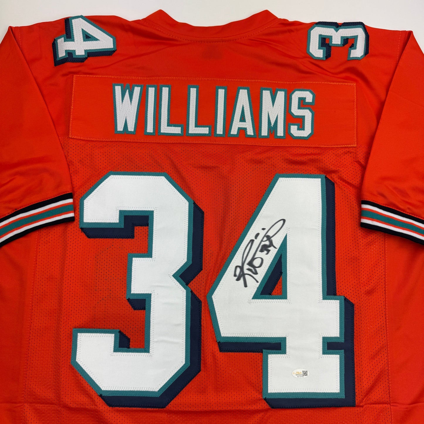 Autographed/Signed Ricky Williams Miami Orange Football Jersey JSA COA