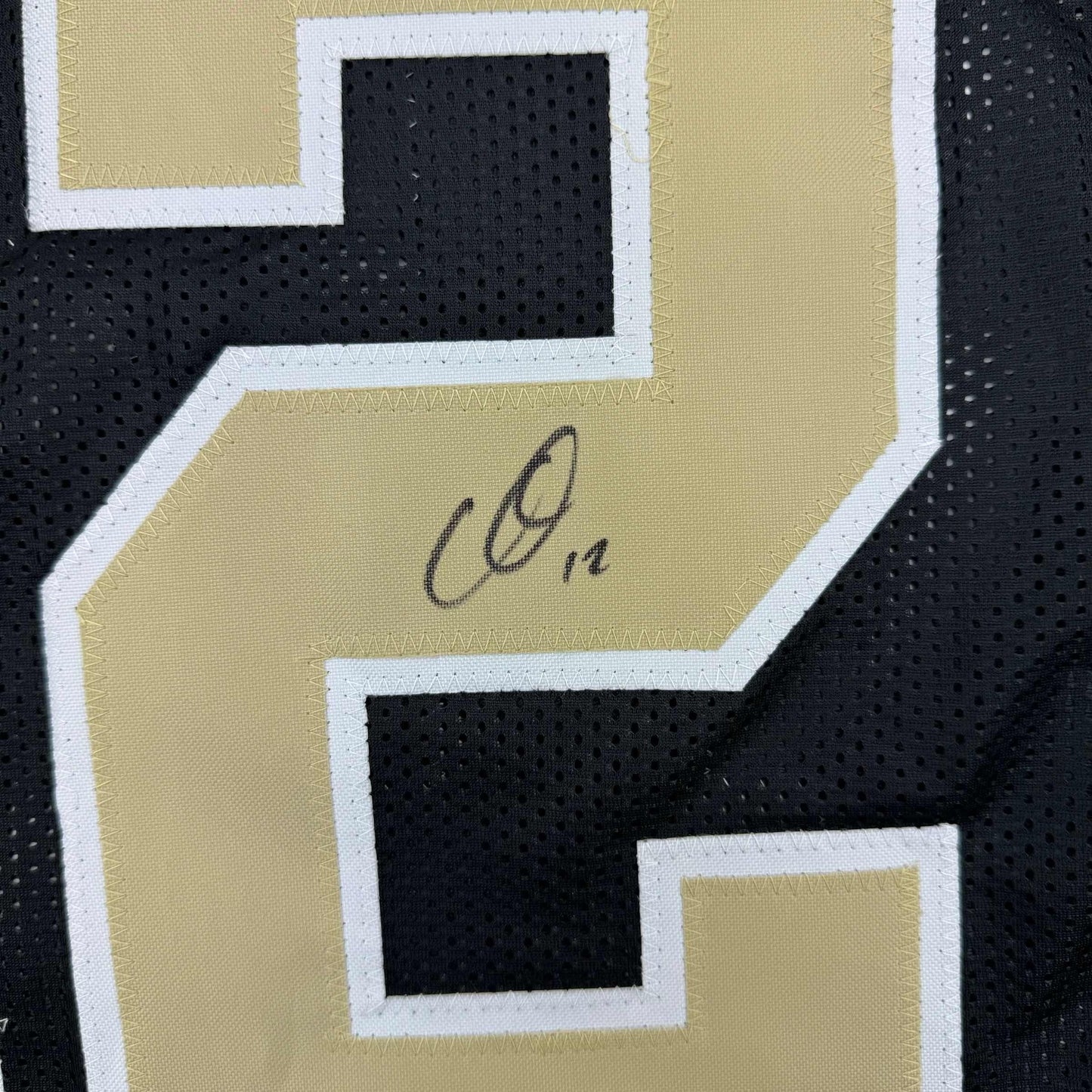 Framed Autographed/Signed Chris Olave 35x39 New Orleans Black Football Jersey Beckett BAS COA