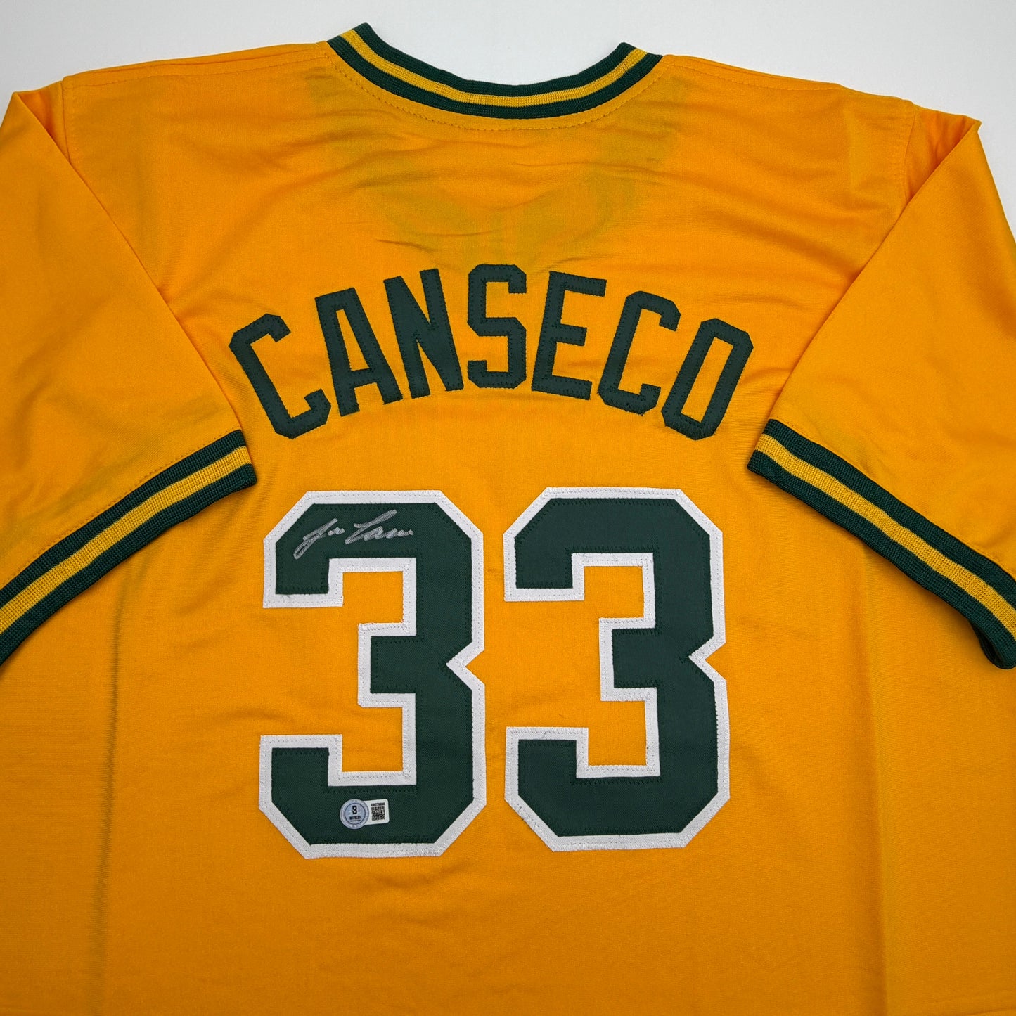 Autographed/Signed Jose Canseco Oakland Yellow Baseball Jersey Beckett BAS COA