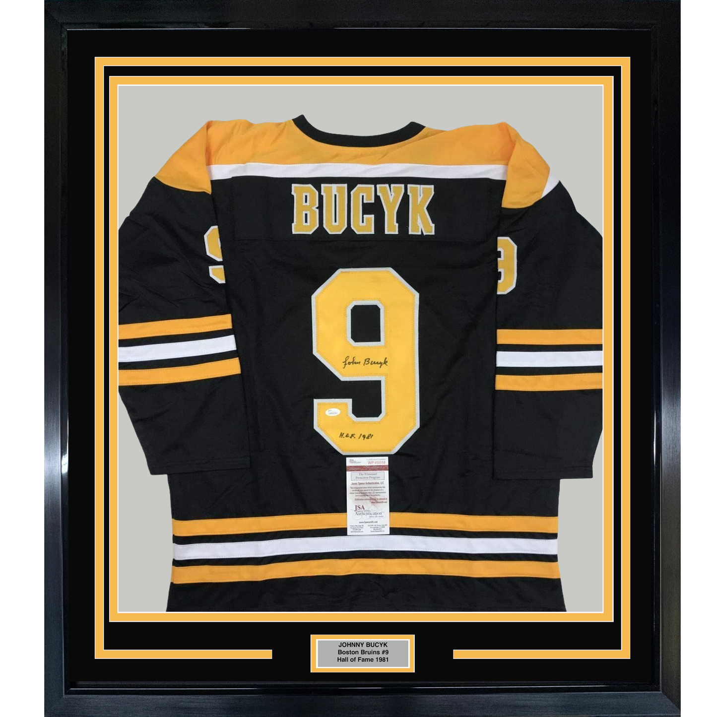 Framed Autographed/Signed John Johnny Bucyk HOF 1981 35x39 Boston Black Hockey Jersey JSA COA